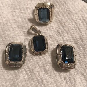 5piece set sterling silver deep blue stone.